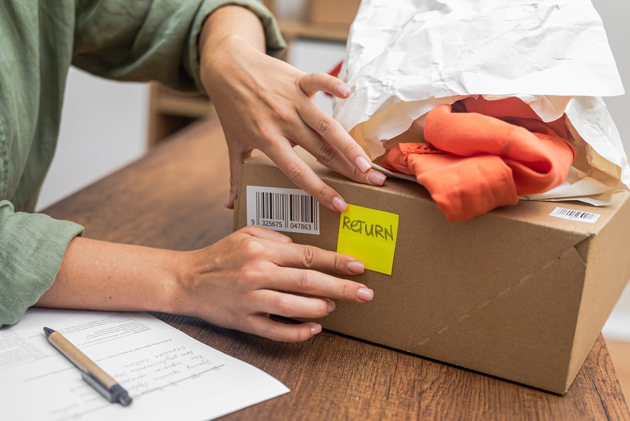 A shopping box with a return label attached.