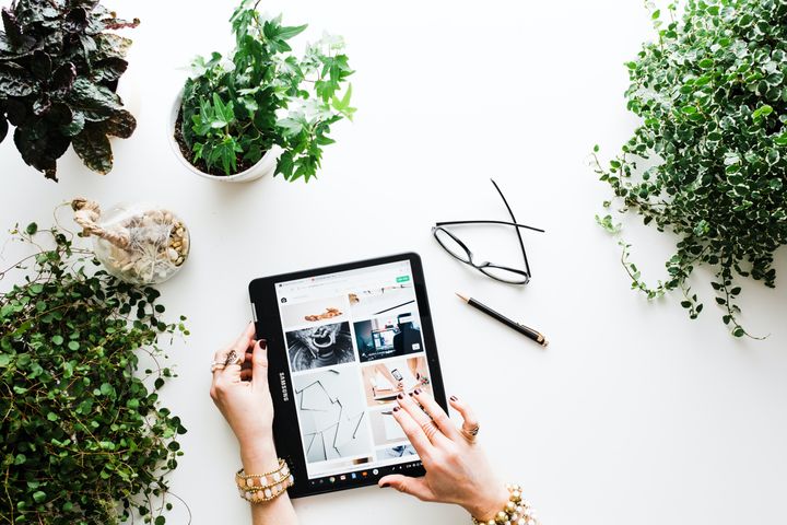 A woman scrolling through an online store.